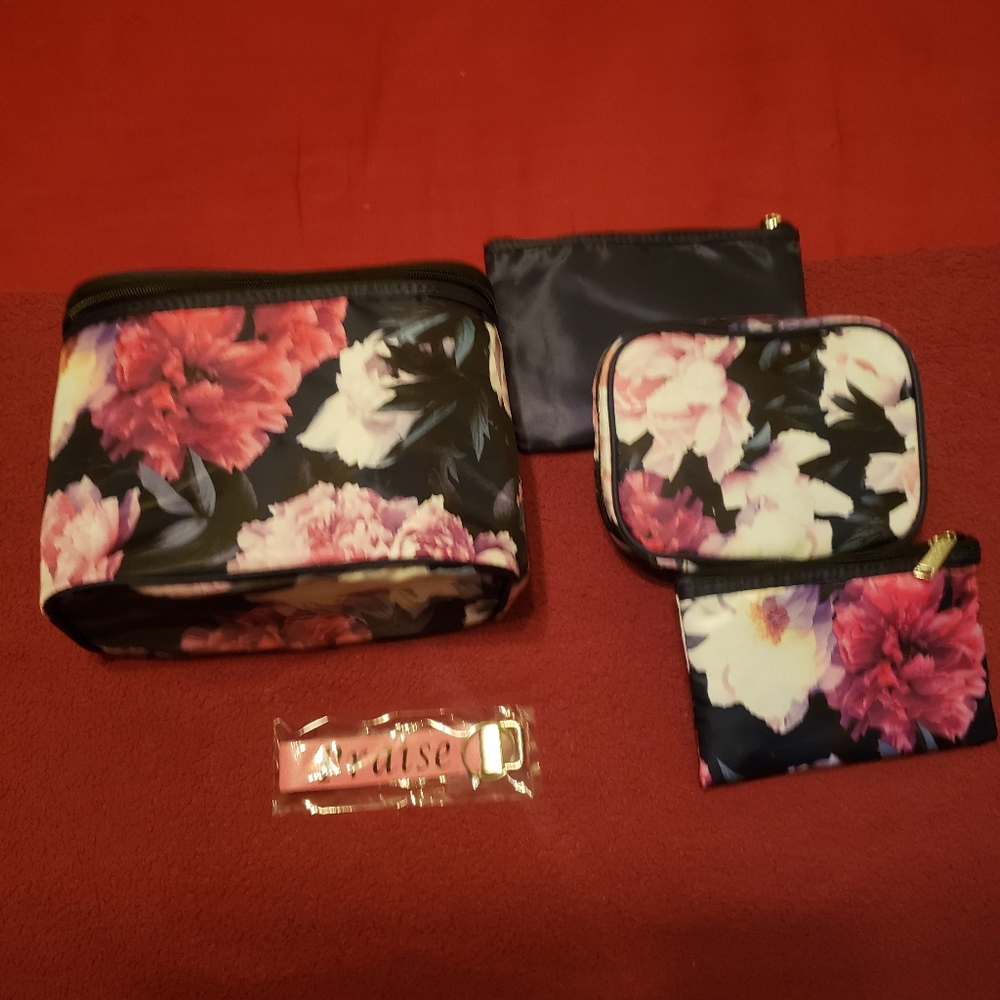 4 beautiful dark blue and floral makeup cases and 1 keychain. Brand new.